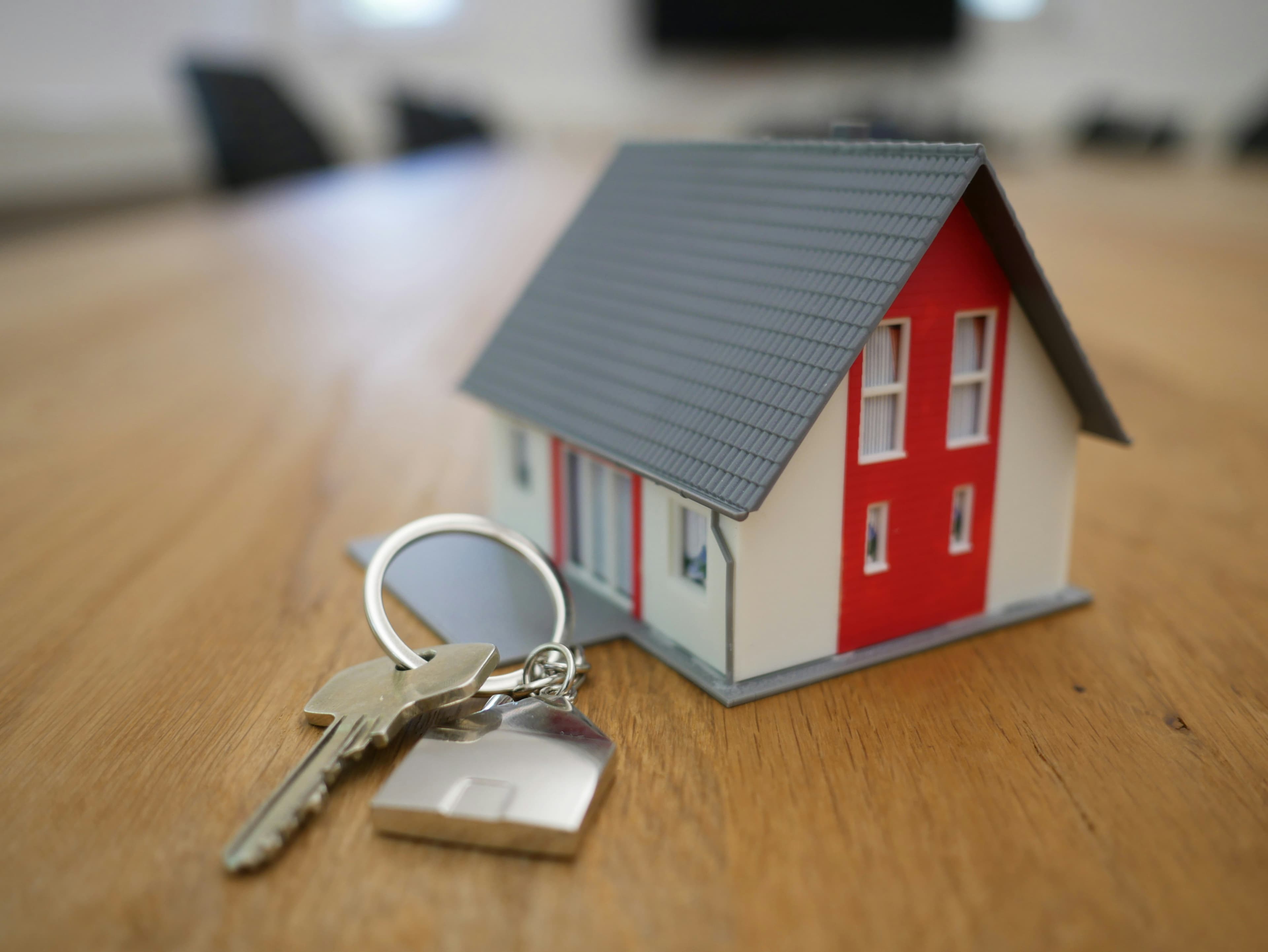Clients happily signing a property agreement